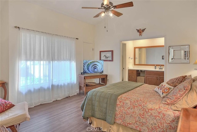 1531 Corte Caballo Unit 33, Upland, CA 91786 - bedroom with wood finished floors, ensuite bathroom, and vaulted ceiling