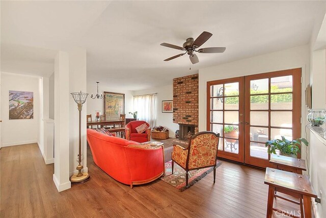 1531 Corte Caballo Unit 33, Upland, CA 91786 - living area with wood finished floors, a ceiling fan, and french doors
