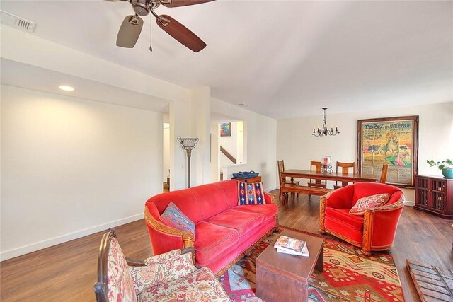 1531 Corte Caballo Unit 33, Upland, CA 91786 - living room with a ceiling fan, a chandelier, wood finished floors, stairs, and recessed lighting