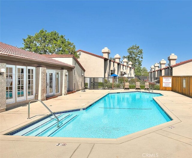 1531 Corte Caballo Unit 33, Upland, CA 91786 - community pool featuring a patio area