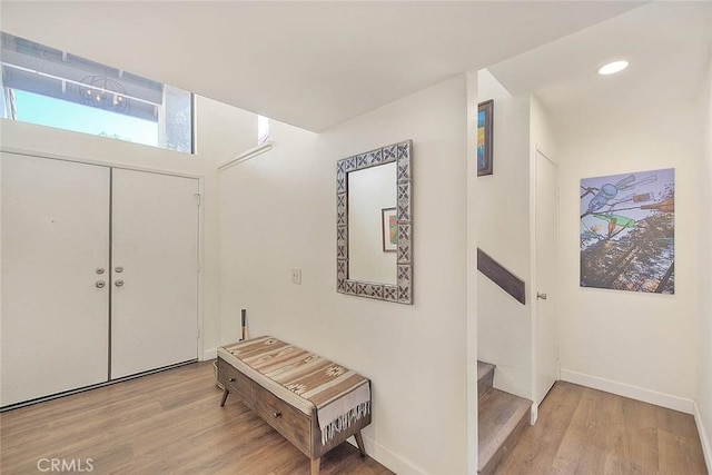 1531 Corte Caballo Unit 33, Upland, CA 91786 - entrance foyer with wood finished floors, recessed lighting, and stairway