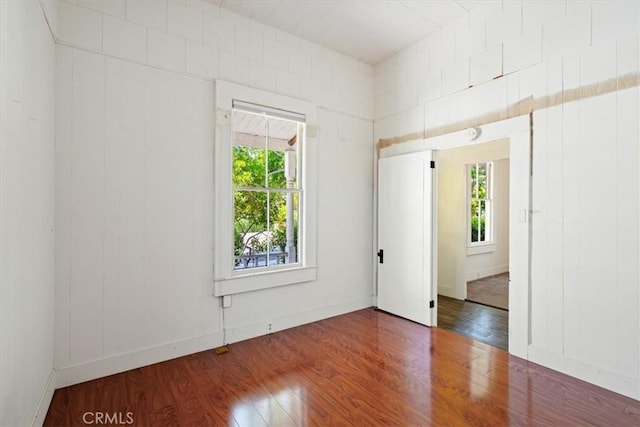 863 Chorro St, San Luis Obispo, CA 93401 - empty room with wood finished floors and healthy amount of natural light