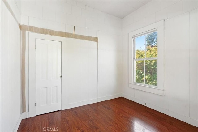 863 Chorro St, San Luis Obispo, CA 93401 - unfurnished room featuring dark wood-style flooring and baseboards