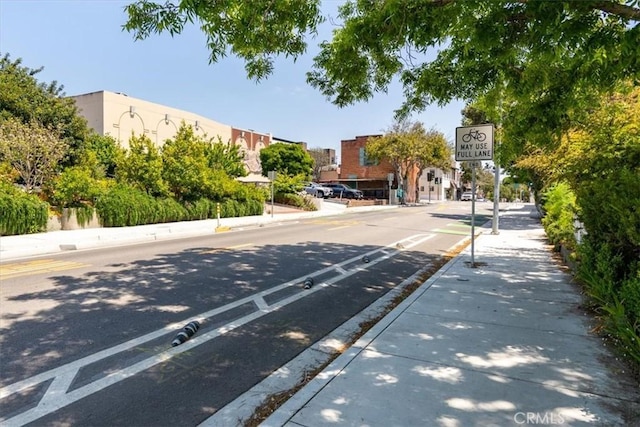 863 Chorro St, San Luis Obispo, CA 93401 - view of asphalt street with sidewalks, curbs, and traffic signs