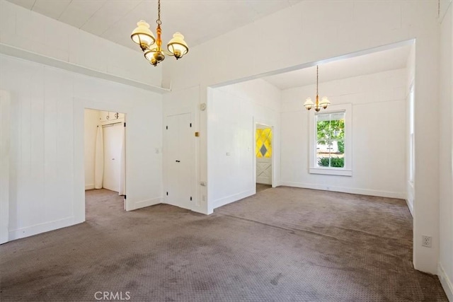 863 Chorro St, San Luis Obispo, CA 93401 - unfurnished dining area with a chandelier and carpet