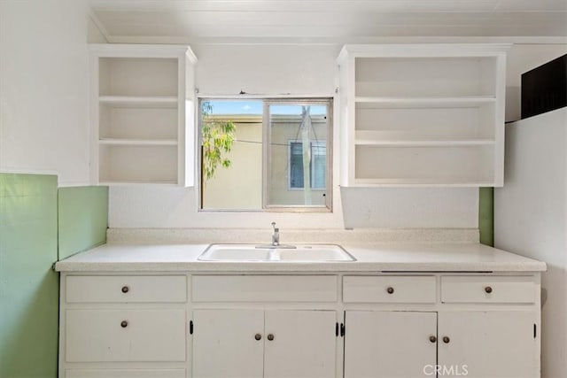 863 Chorro St, San Luis Obispo, CA 93401 - kitchen with open shelves, white cabinetry, and light countertops