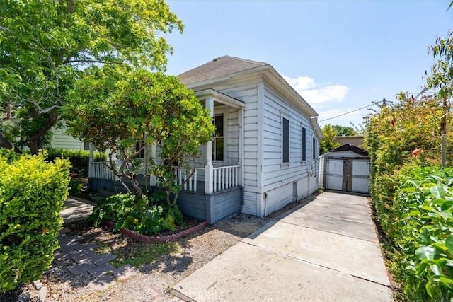 863 Chorro St, San Luis Obispo, CA 93401 - view of front of property with a shed and covered porch