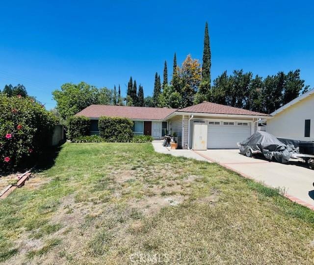 18759 Mayall St, Northridge, CA 91324 - single story home with a garage, a front yard, and concrete driveway