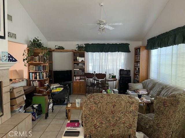 18759 Mayall St, Northridge, CA 91324 - living area featuring lofted ceiling, light tile patterned floors, and a ceiling fan