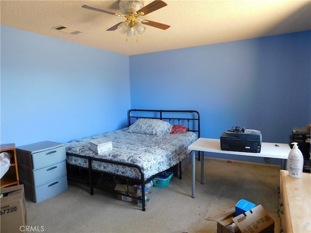 8372 Dogwood Ave, California City, CA 93505 - carpeted bedroom with a textured ceiling and a ceiling fan