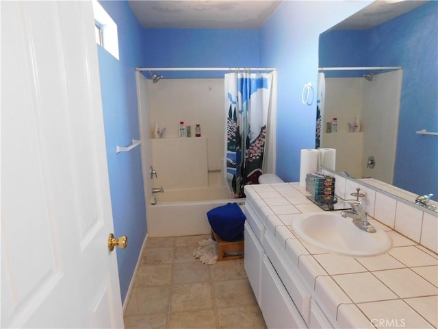 8372 Dogwood Ave, California City, CA 93505 - bathroom with shower / bath combination with curtain, vanity, and tile patterned floors