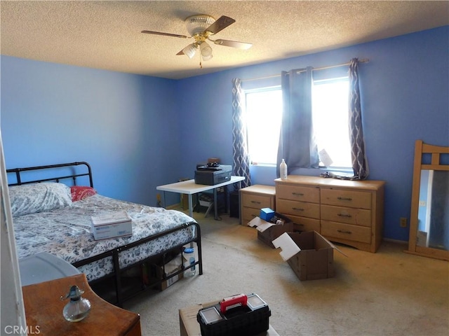 8372 Dogwood Ave, California City, CA 93505 - bedroom with a textured ceiling, light colored carpet, and ceiling fan