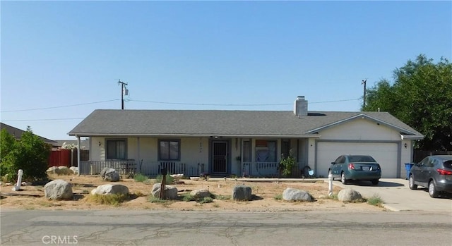 8372 Dogwood Ave, California City, CA 93505 - ranch-style home with a porch, a garage, concrete driveway, and a chimney