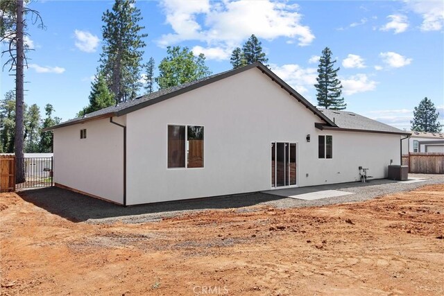1761 Drayer Dr, Paradise, CA 95969 - rear view of house with a patio area and stucco siding