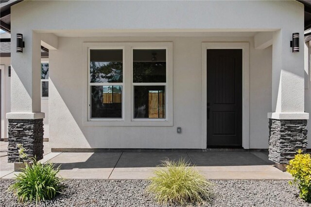 1761 Drayer Dr, Paradise, CA 95969 - doorway to property with stucco siding and stone siding