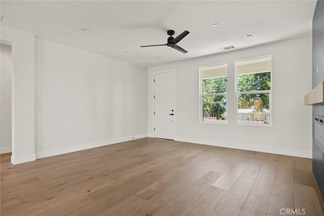 1761 Drayer Dr, Paradise, CA 95969 - unfurnished living room featuring a ceiling fan, wood-type flooring, and recessed lighting