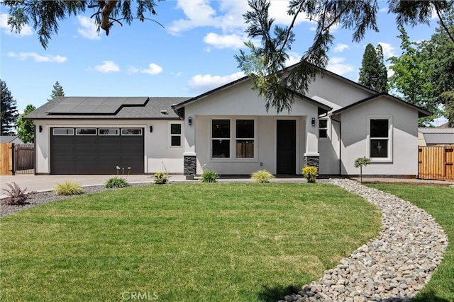 1761 Drayer Dr, Paradise, CA 95969 - single story home featuring stucco siding, roof mounted solar panels, an attached garage, concrete driveway, and a gate