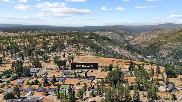 1761 Drayer Dr, Paradise, CA 95969 - aerial overview of property's location with a mountainous background