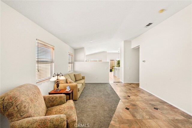 33546 Maplewood Ct, Temecula, CA 92592 - living room with light tile patterned floors and vaulted ceiling