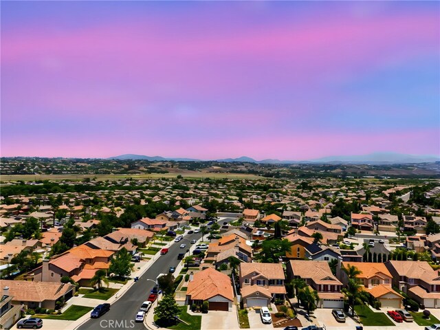 33546 Maplewood Ct, Temecula, CA 92592 - aerial view at dusk of a residential view and a mountain view