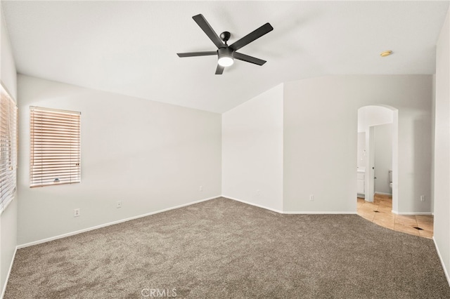 33546 Maplewood Ct, Temecula, CA 92592 - carpeted empty room with lofted ceiling, ceiling fan, arched walkways, and a smoke detector