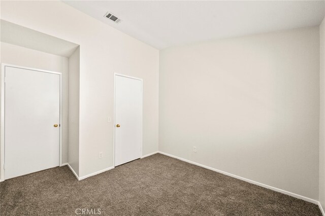 33546 Maplewood Ct, Temecula, CA 92592 - unfurnished bedroom featuring dark colored carpet