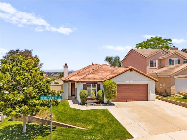 33546 Maplewood Ct, Temecula, CA 92592 - mediterranean / spanish house featuring concrete driveway, a garage, stucco siding, and a tile roof