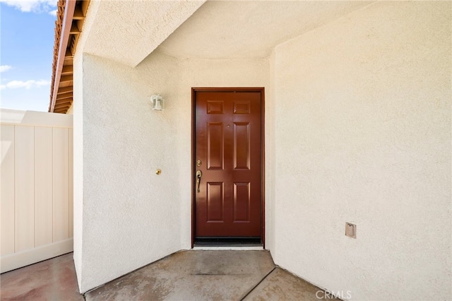 33546 Maplewood Ct, Temecula, CA 92592 - doorway to property with stucco siding
