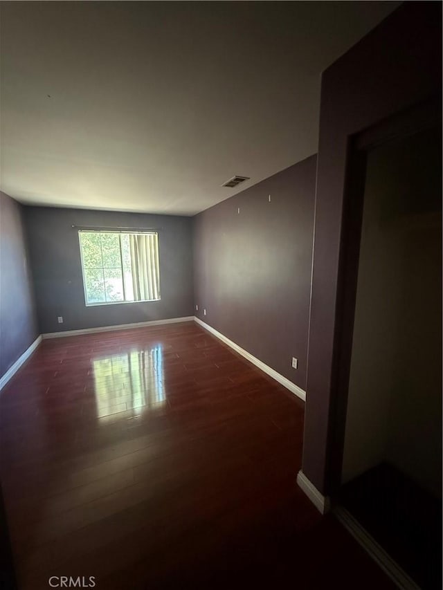 13590 Fox Point Rd, Victorville, CA 92392 - unfurnished room featuring baseboards and wood finished floors