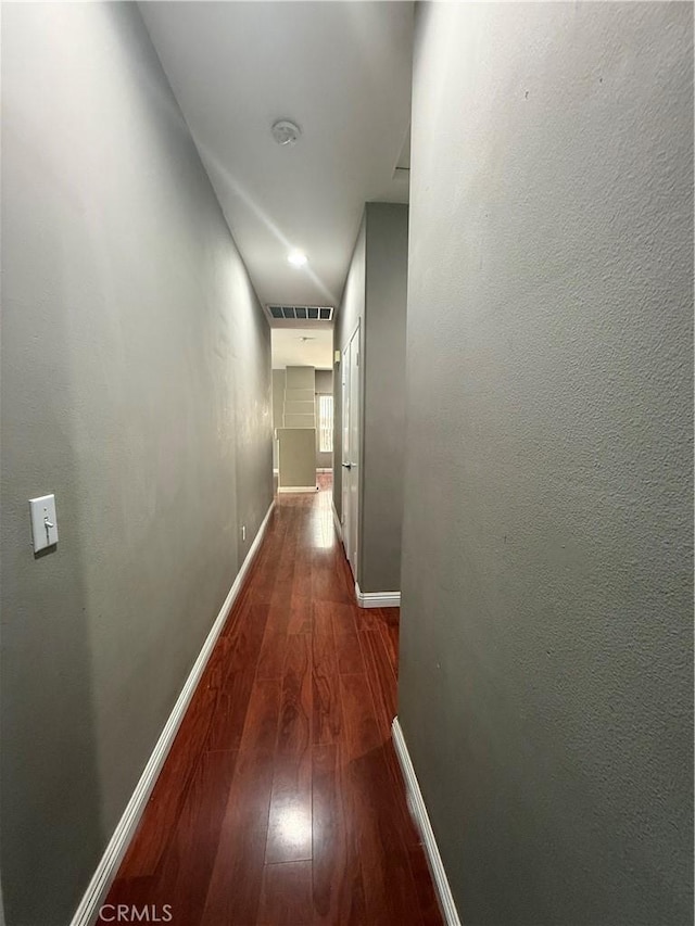 13590 Fox Point Rd, Victorville, CA 92392 - corridor with dark wood-type flooring and baseboards