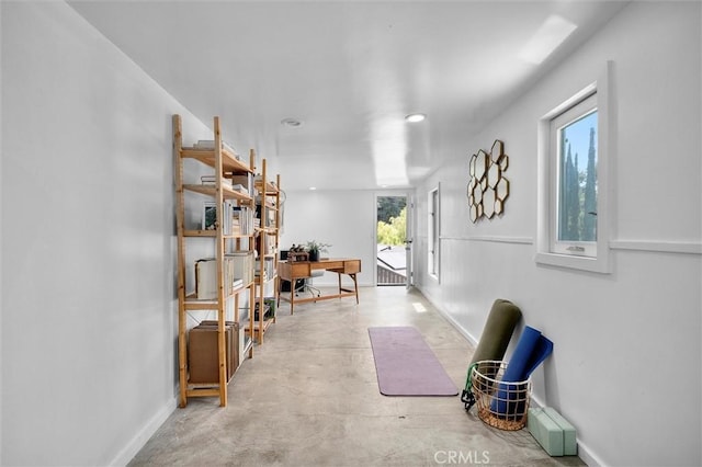 4698 Morro Dr, Woodland Hills, CA 91364 - hallway with a desk, recessed lighting, and concrete floors