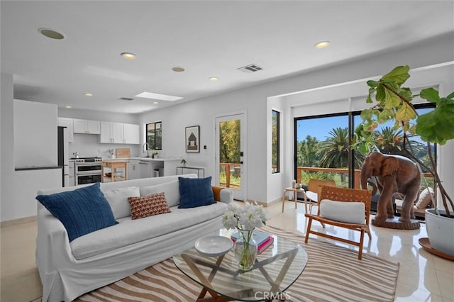 4698 Morro Dr, Woodland Hills, CA 91364 - living area featuring recessed lighting and light tile patterned flooring
