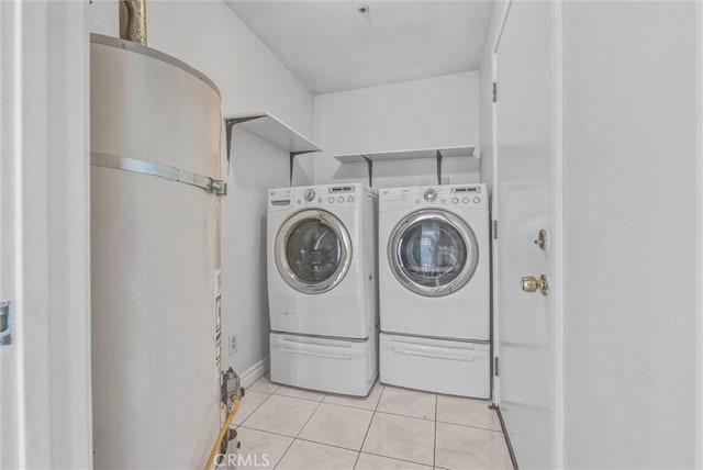 10102 Rio Hondo, El Monte, CA 91733 - laundry room with independent washer and dryer and light tile patterned floors