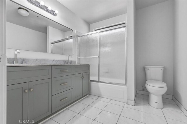10102 Rio Hondo, El Monte, CA 91733 - bathroom with double vanity, combined bath / shower with glass door, and tile patterned flooring