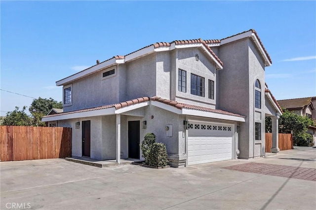 10102 Rio Hondo, El Monte, CA 91733 - view of front of house featuring a tiled roof, stucco siding, and an attached garage