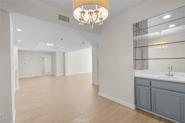 4348 Mammoth Ave Unit 102, Sherman Oaks, CA 91423 - bar with light wood-style flooring, recessed lighting, a chandelier, and pendant lighting