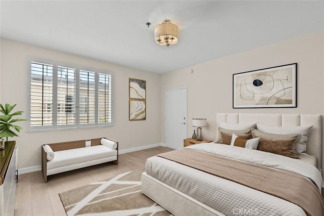 4348 Mammoth Ave Unit 102, Sherman Oaks, CA 91423 - bedroom with wood finished floors