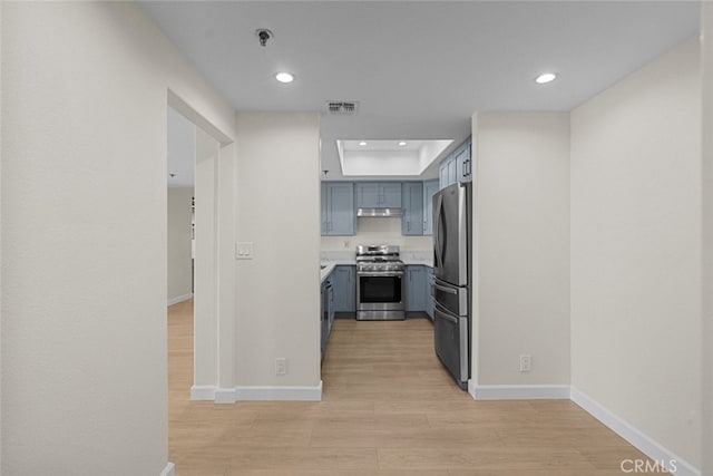 4348 Mammoth Ave Unit 102, Sherman Oaks, CA 91423 - kitchen featuring stainless steel appliances, light wood-style flooring, under cabinet range hood, light countertops, and recessed lighting