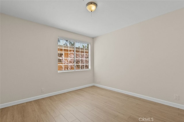 4348 Mammoth Ave Unit 102, Sherman Oaks, CA 91423 - unfurnished room with light wood finished floors and baseboards