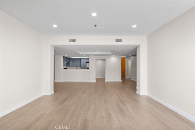 4348 Mammoth Ave Unit 102, Sherman Oaks, CA 91423 - unfurnished living room with light wood finished floors and recessed lighting
