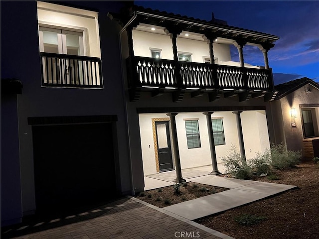 22046 Fig Tree Ln, Chatsworth, CA 91311 - back of house with a balcony and stucco siding