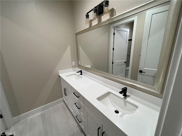 22046 Fig Tree Ln, Chatsworth, CA 91311 - full bathroom featuring marble finish flooring and double vanity