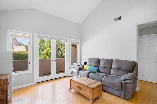 4324 Park Verdi, Calabasas, CA 91302 - living room with french doors, high vaulted ceiling, and light wood-style flooring