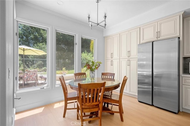 4324 Park Verdi, Calabasas, CA 91302 - dining room featuring crown molding, a chandelier, and light wood-type flooring