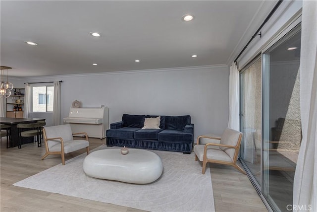 9418 Via Patricia Unit 30, Burbank, CA 91504 - living area featuring ornamental molding, light wood-style flooring, recessed lighting, and a chandelier