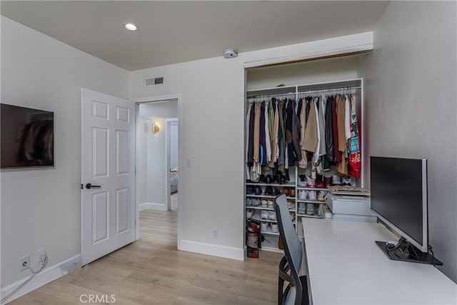 9418 Via Patricia Unit 30, Burbank, CA 91504 - bedroom with light wood-type flooring, an office area, a closet, and recessed lighting