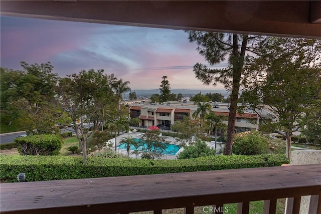 9418 Via Patricia Unit 30, Burbank, CA 91504 - balcony at dusk featuring view of pool area