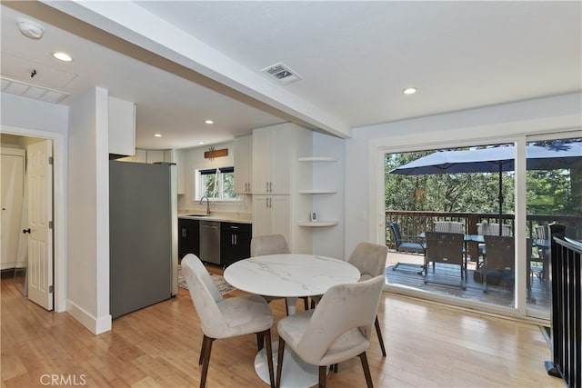 582 Sunset View Rd, Twin Peaks, CA 92391 - dining space featuring light wood-style floors, recessed lighting, and beam ceiling