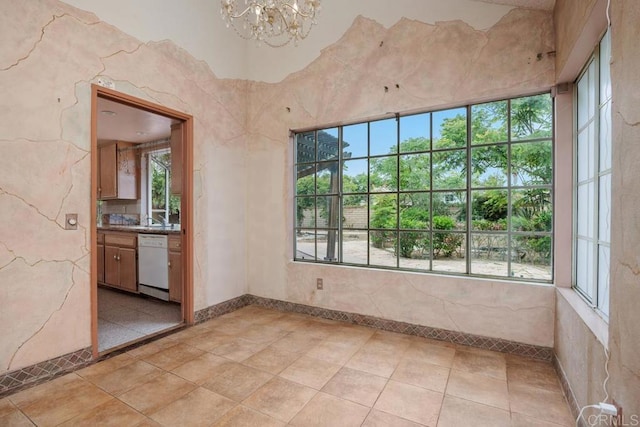 4556 Mariners Bay, Oceanside, CA 92057 - spare room with a chandelier and light tile patterned floors