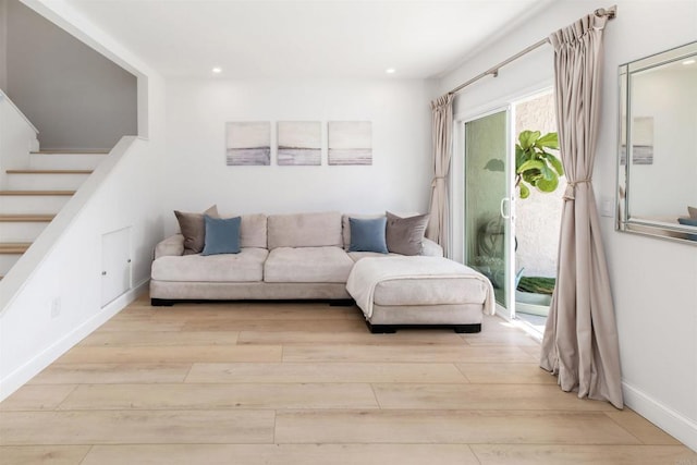 2340 Caringa Way Unit B, Carlsbad, CA 92009 - living room featuring wood-type flooring, recessed lighting, and stairway